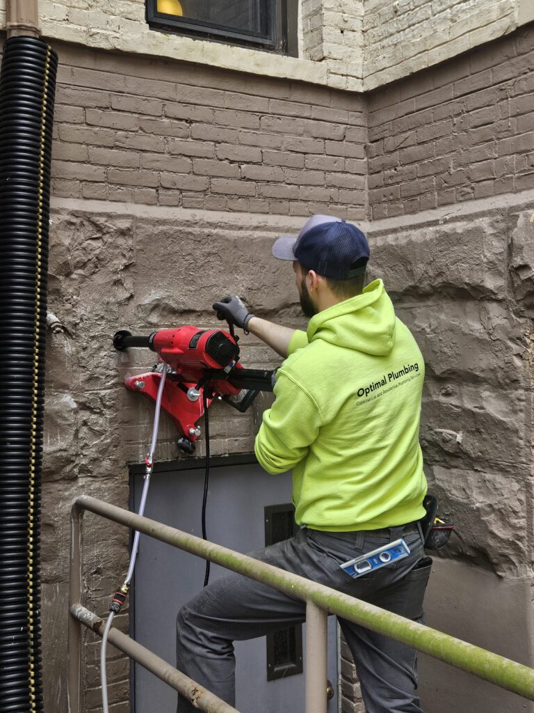 Today's project involved coring a new opening through masonry to prepare for plumbing installation.