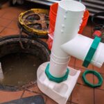 We cleaned the drain, replaced the damaged baffles